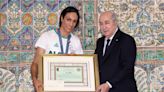 Gender row boxer Imane Khelif given hero's welcome by Algerian president after gold medal win