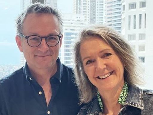 Dr Michael Mosley's widow says family are 'trying to put over lives back together' a month after his death