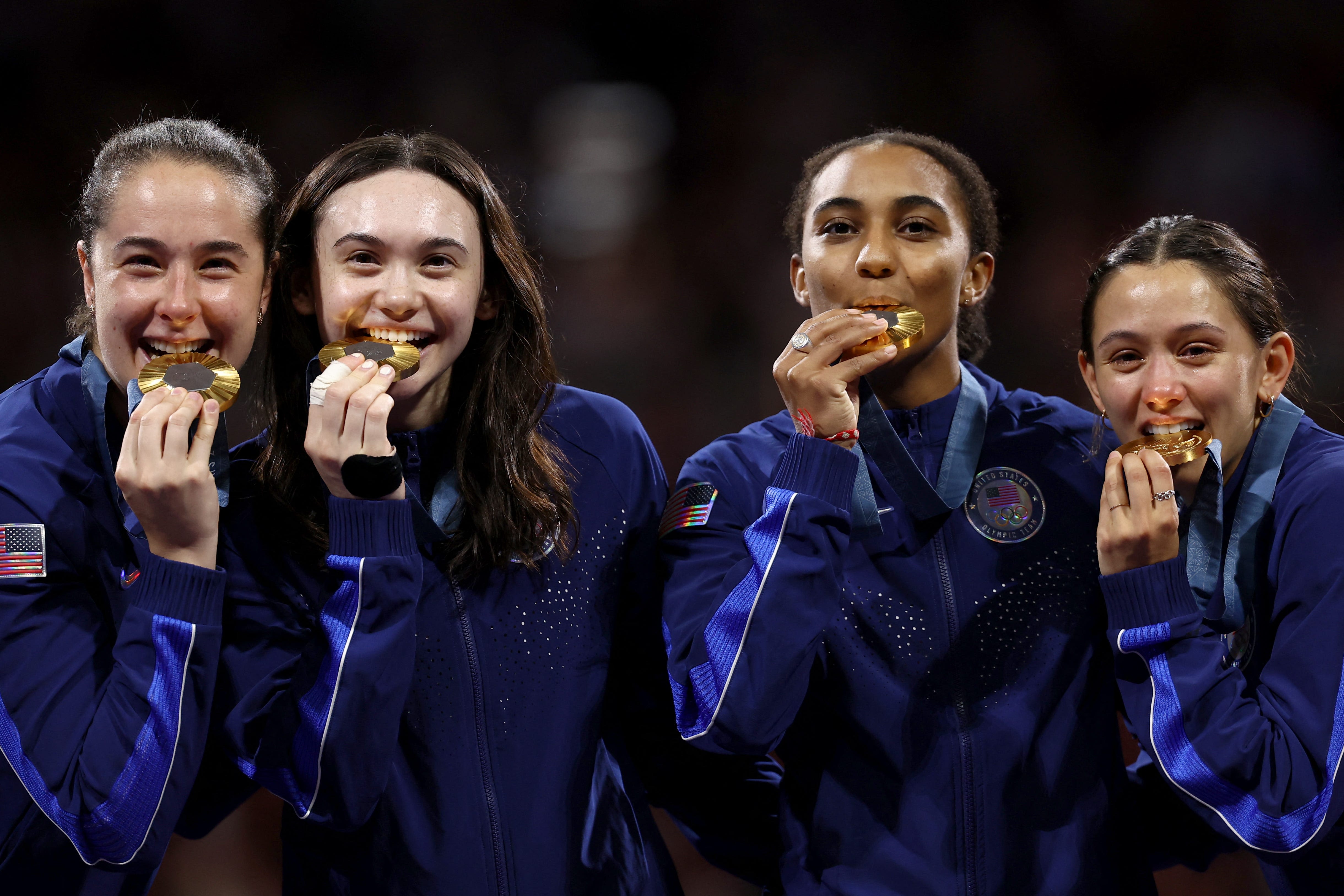 Photos of former Notre Dame fencer Lee Kiefer winning team foil gold