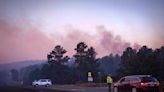 New Mexico governor declares emergency as thousands flee wildfires that have damaged 500 structures