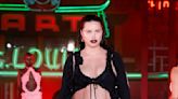 Pregnant Adriana Lima, 40, bares her baby bump on the runway