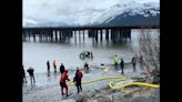 Angler sinks deep into thick mud and gets trapped while fishing in Alaska river