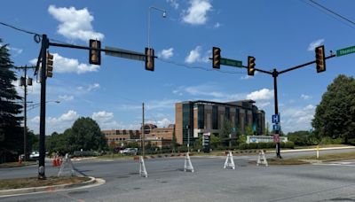 Downed powerline sparks small brush fire in front of Lynchburg Central General Hospital