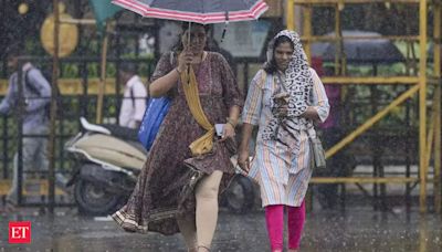 In Pics: Monsoon paints Mumbai with rain, yellow alert issued - Monsoon in full swing