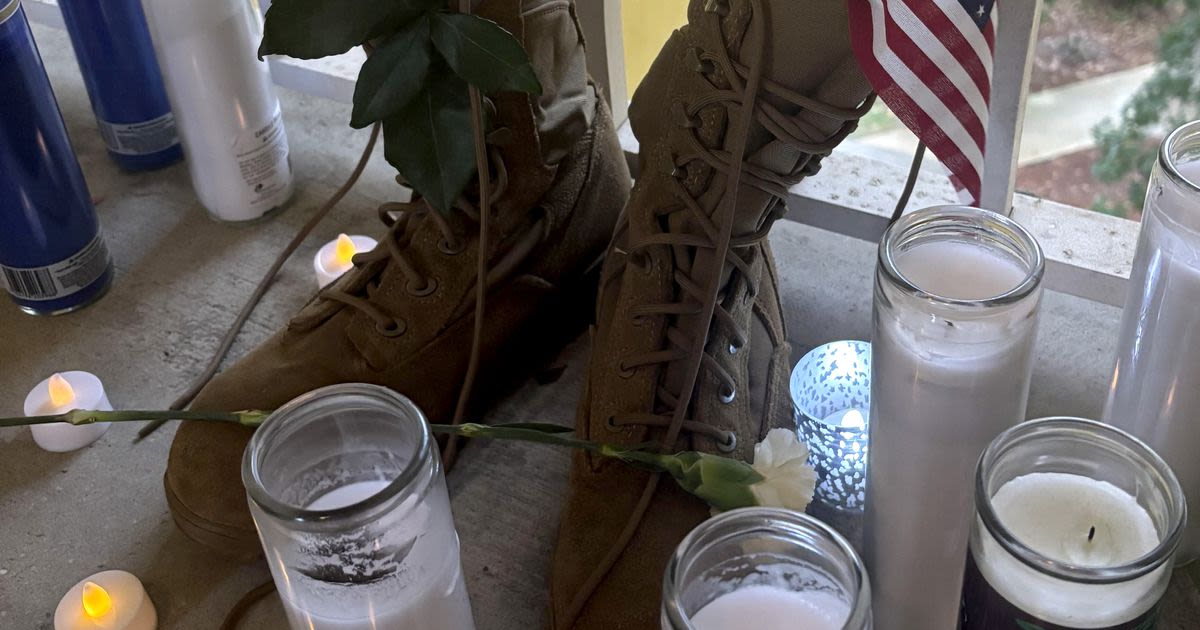 Questions and grief linger at the apartment door where a deputy killed a US airman