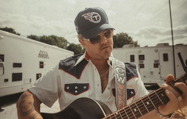 ERNEST discusses Morgan Wallen collaboration 'Cowgirls,' neotraditional country success