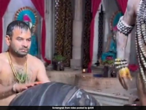 Watch: Tej Pratap Yadav Hugs Shivling As Milk Is Poured Over Him