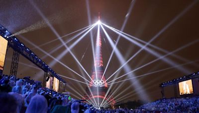 Paris shines through summer storm in spectacular Olympic opening ceremony