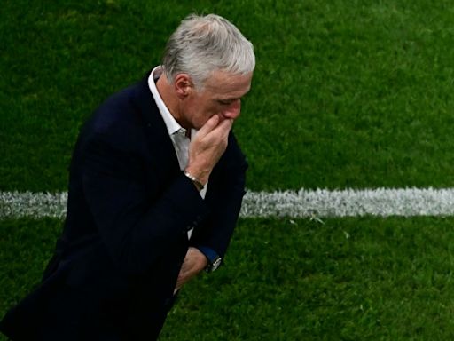 France coach Deschamps holds hands up after Euro 2024 exit