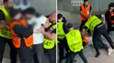 Shocking moment fan is punched and kicked by group of stewards at Euro 2024