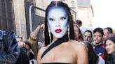 Doja Cat dazzled at a Paris Fashion Week show with alien superstar-themed blue and white face paint