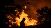 Kansas official hopeful that fire crews can control a blaze at a recycling center