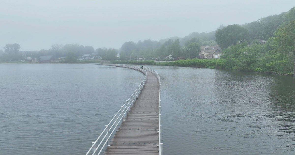 New 3,000-foot floating boardwalk allows visitors to "walk on water" in this Massachusetts city