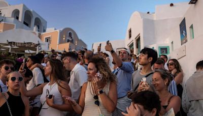 Greece's Santorini bursts with tourists as locals call for a cap - ET TravelWorld