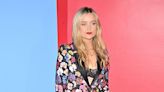 Laura Whitmore shows off cleavage in a lace bra as she poses at NYFW