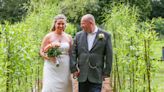 Couple throw carbon neutral wedding with pre-loved outfits, biodegradable cutlery and tree planting