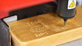 Gold down 1% as dollar, yields rise on Fed rate-hike bets