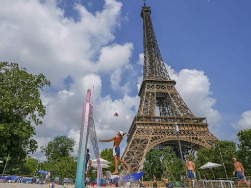 Beach volleyball at Eiffel Tower stadium draws the crowds looking for the perfect social media post