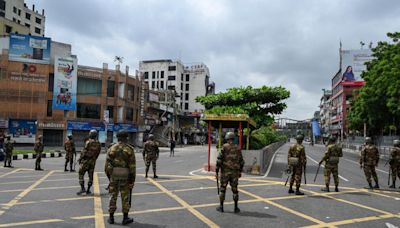 Bangladesh imposes curfew, calls in military as unrest continues