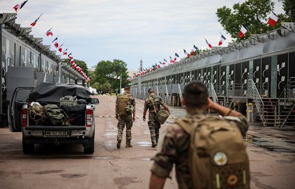 Attacker stabs and wounds French soldier patrolling Paris ahead of the Olympics