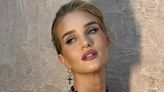 Rosie Huntington-Whiteley stuns in a semi-sheer lace jumpsuit in Italy
