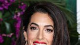 Amal Clooney Proves She's Aging Like Fine Wine In An Off-The-Shoulder Red Gown While George Helps Smooth Her Train