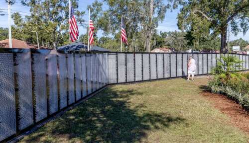 Honoring those who gave: traveling Vietnam Memorial Wall stops at College of DuPage
