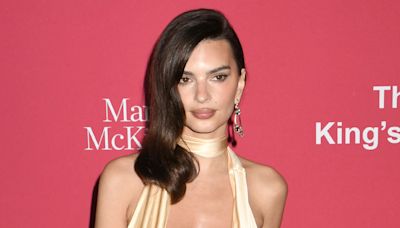 Emily Ratajkowski slammed for ‘unacceptable’ wardrobe malfunction in gold dress