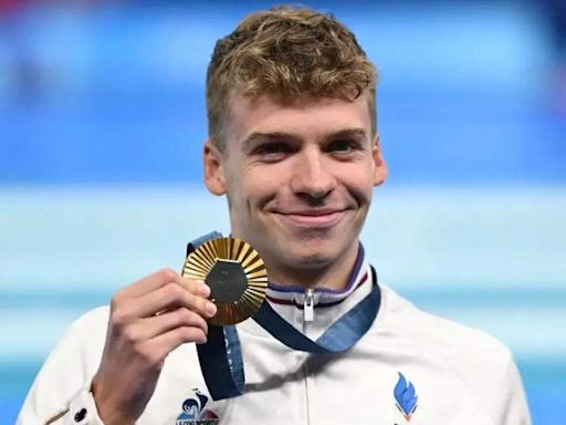 Nicknamed 'French Michael Phelps', Leon Marchand bags 400 metres gold individual medley with new Olympic record | Paris Olympics 2024 News - Times of India