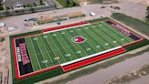 New Montana Western turf football field nearing completion, stadium building progressing