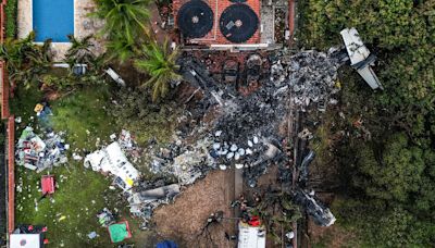 Brazil plane crash: Bodies recovered from wreckage after 62 killed