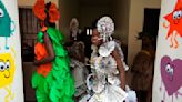 Nigerian teens create fashion from trash to fight pollution