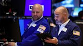 US stocks rally as Fed holds rates, prompts hope for end to hikes