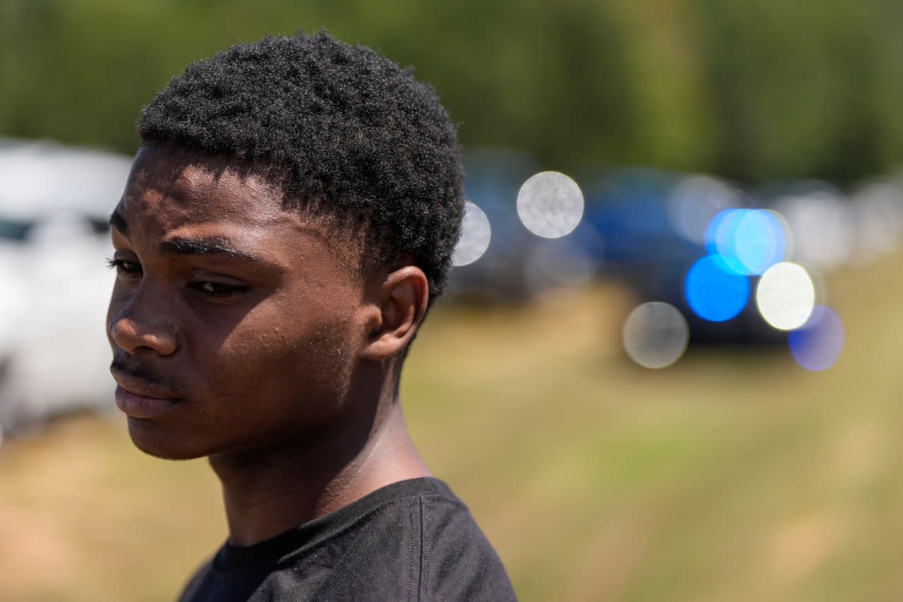 A teen charged with killing 4 people at a Georgia high school was interviewed about online threats