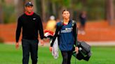 Tiger Woods' daughter Sam serves as his caddie for 1st time