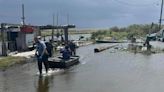 Woman living below floodgates rescued from home in Golden Meadow, Lafourche authorities say