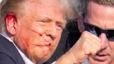 Trump is wounded but 'fine' after apparent assassination attempt; suspect had bomb-making materials