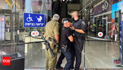 2 men stabbed in 'terror attack' at Israeli mall - Times of India