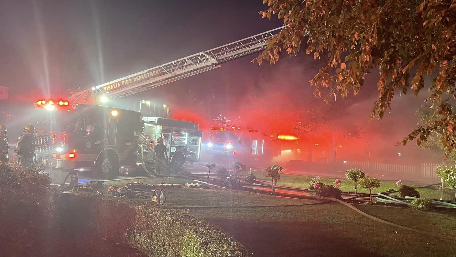 Firefighters working to contain house fire in Visalia neighborhood