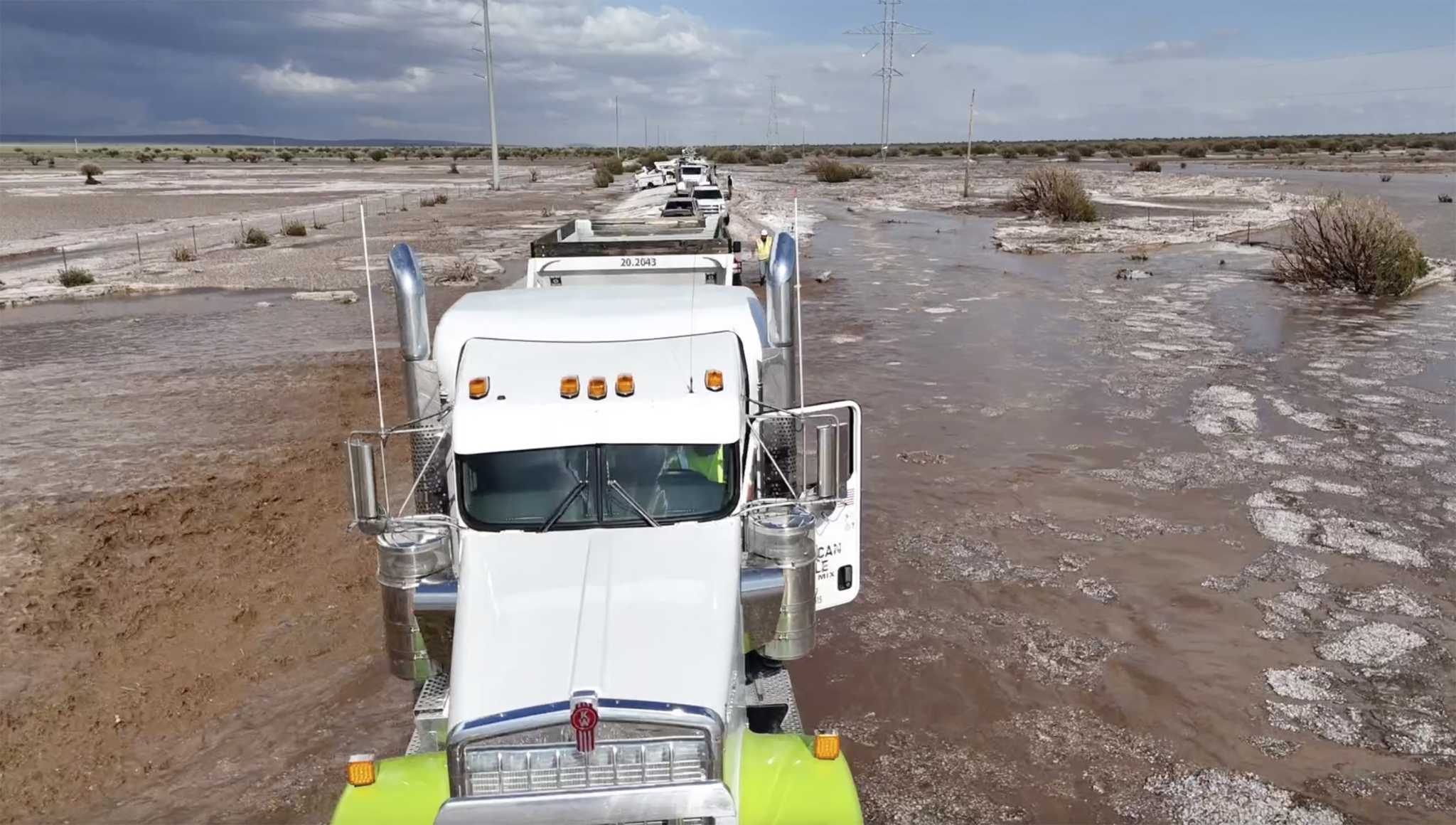 Floodwaters inundate Minnesota towns while another storm transformed New Mexico village into a lake