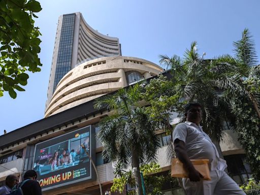 Indian stocks hit record highs as exit polls suggest big Modi win