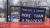 Authorities clearing out tent encampment at Colonial Building