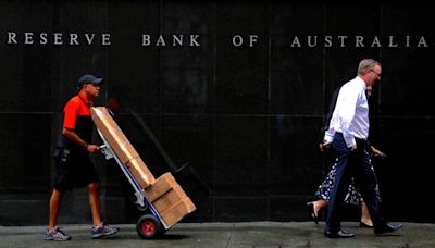 Australia's central bank says policy is restrictive, causing households pain