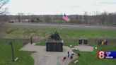 Community members install flags at Iwo Jima Memorial in New Britain