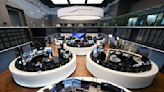 Germany's DAX stock market index tops 18,000 for first time