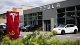 Ex-Tesla worker says he lost job despite sacrifices, including sleeping in car