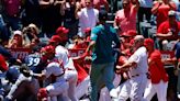 Reactions: Jesse Winker HBP sparks Angels-Mariners brawl; ex-Red flips off Anaheim crowd