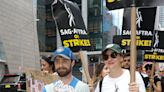 Daniel Radcliffe and girlfriend Erin Darke bring newborn baby to SAG picket line