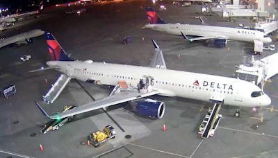 Delta Plane’s Nose Bursts Into Flames After Landing as Passengers Rush to Evacuate via Wings and Slide: WATCH