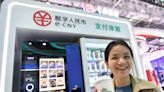 China launches digital yuan ATMs in tropical Sanya, allowing tourists to exchange foreign cash for e-CNY